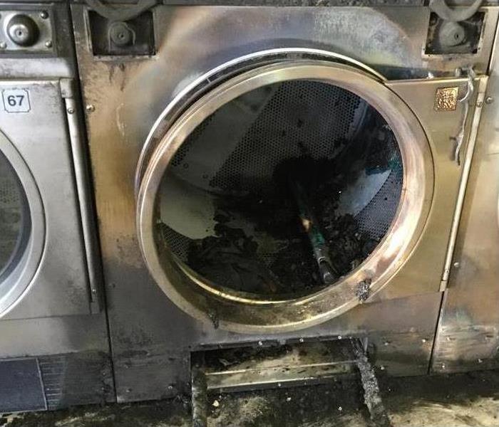 Burnt Dryer from Laundromat Fire