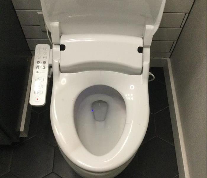 Smart toilet in bathroom 